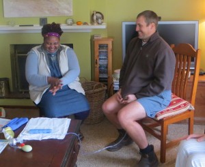 Gareth ready to birth while Memory washes her hands